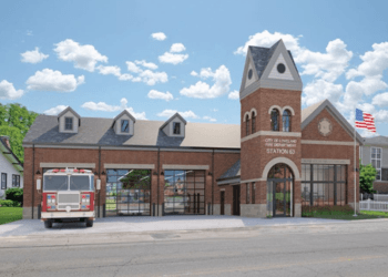 Fire station with fire truck and US flag